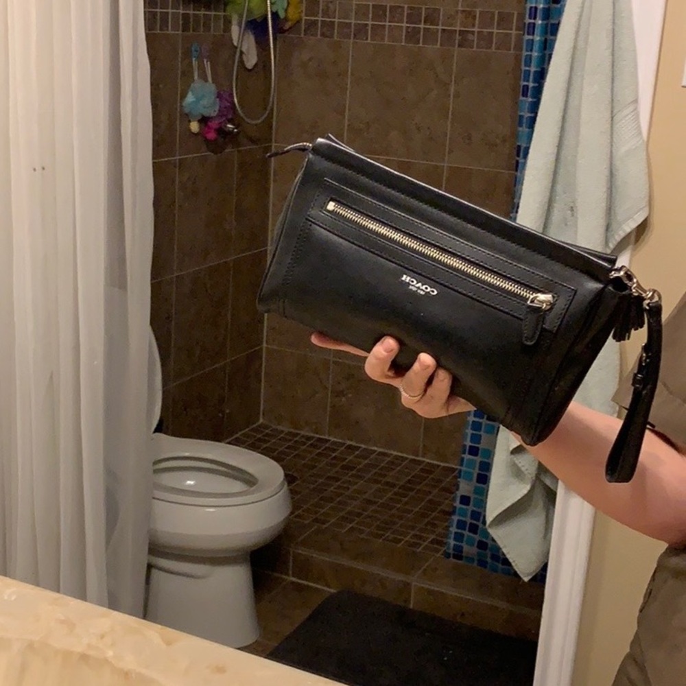 Used Coach legacy large leather clutch